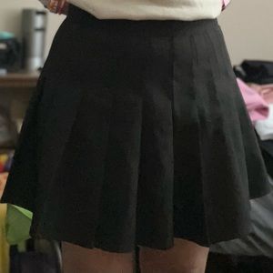 black pleated skirt